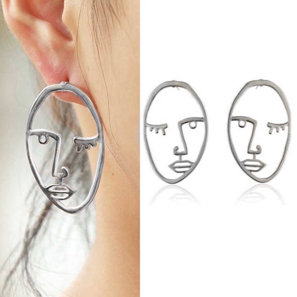 2/$20! Silver Abstract Visage Earrings - Picture 2 of 11
